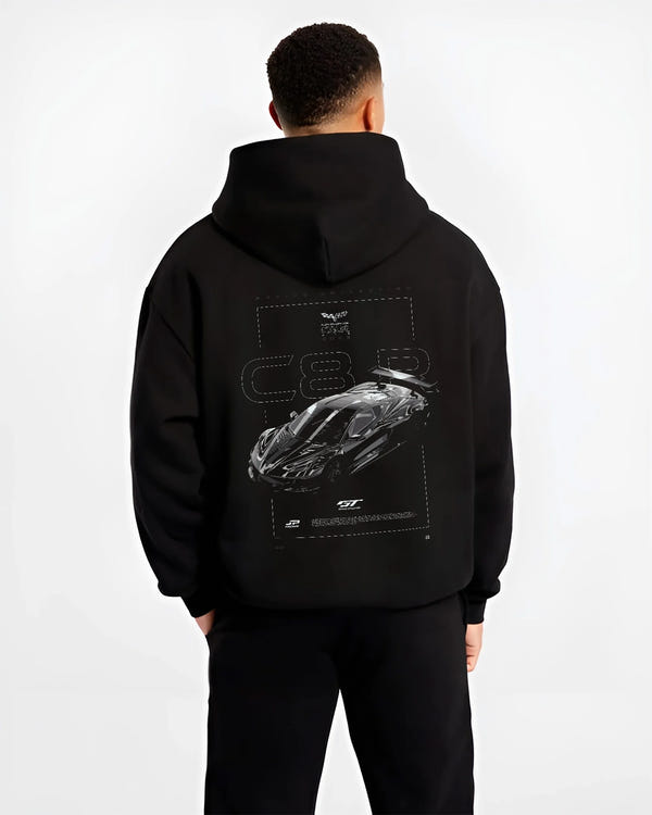 Black hoodie worn by a male model, back view, featuring Chevrolet Corvette C8 corvette racing american muscle street retro graphic.