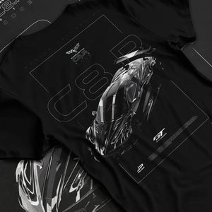 Black T-shirt laid flat with natural fabric folds, featuring Chevrolet Corvette C8 corvette racing american muscle street graphic.