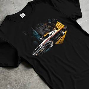 Black T-shirt laid flat with natural fabric folds, featuring Chevrolet Chevelle rs american muscle retro classic enthusiast graphic.