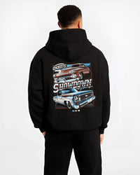 Black hoodie worn by a male model, back view, featuring racing american muscle retro vintage classic show street graphic.