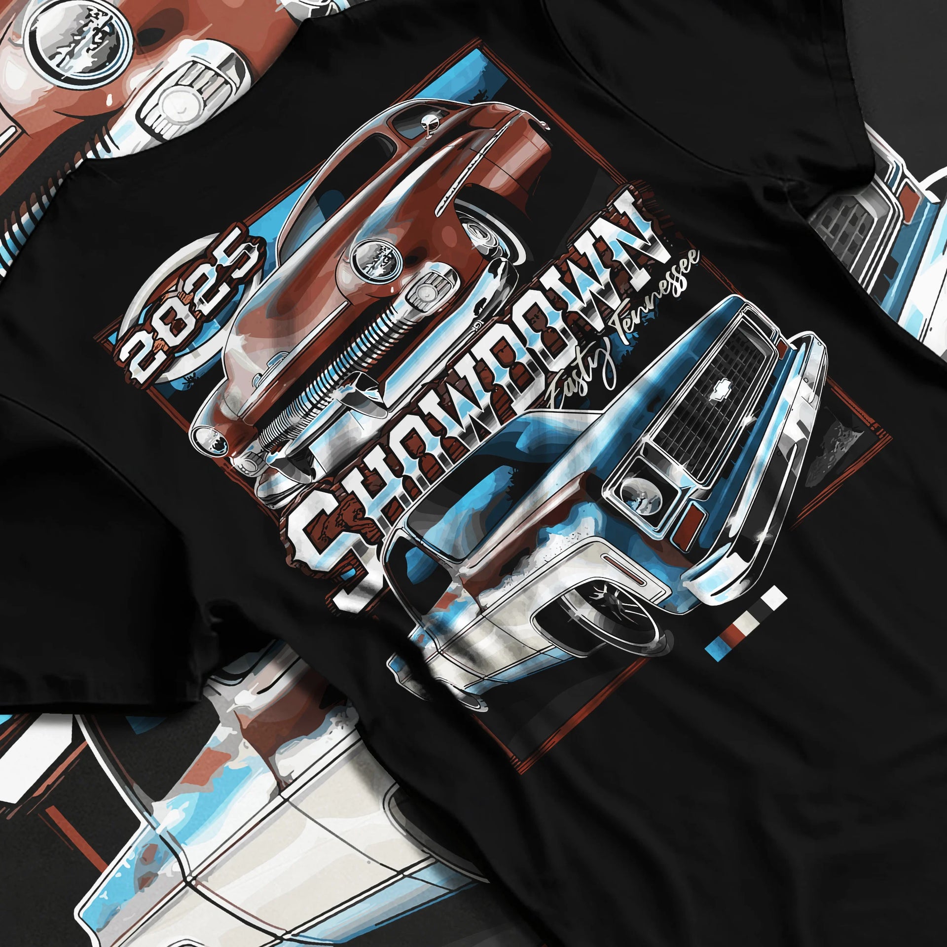 Black T-shirt laid flat with natural fabric folds, featuring racing american muscle retro vintage classic show street graphic.