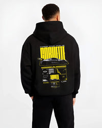 Black hoodie worn by a male model, back view, featuring Chevrolet Corvette gt3 rs racing motorsport street performance graphic.