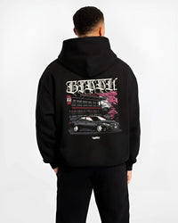 Black hoodie worn by a male model, back view, featuring Toyota rs race drift jdm japanese street racing graphic.