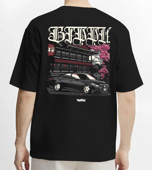 Black T-shirt worn by a male model, back view, featuring Toyota rs race drift jdm japanese street racing graphic.