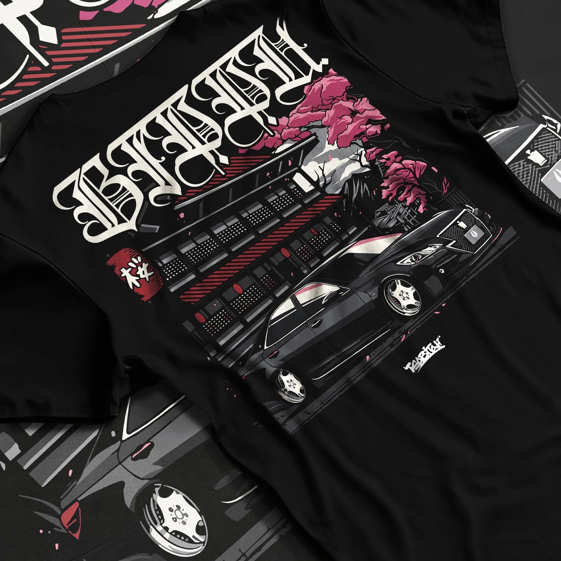 Black T-shirt laid flat with natural fabric folds, featuring Toyota rs race drift jdm japanese street racing graphic.