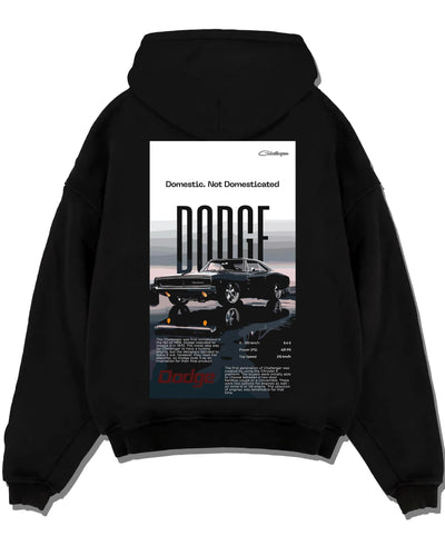 Black pullover hoodie laid flat on a white background, featuring Dodge Challenger american muscle street retro classic graphic.