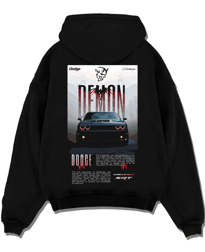 Black pullover hoodie laid flat on a white background, featuring Dodge Challenger racing muscle street retro enthusiast graphic.