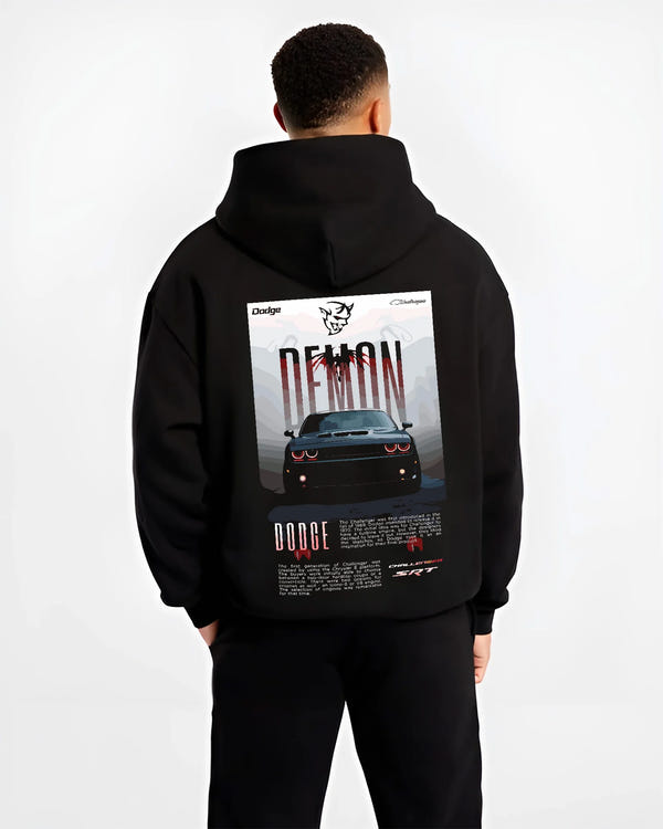 Black hoodie worn by a male model, back view, featuring Dodge Challenger racing muscle street retro enthusiast performance graphic.