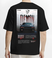 Black T-shirt worn by a male model, back view, featuring Dodge Challenger racing muscle street retro enthusiast performance graphic.
