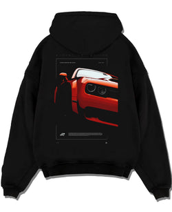 Black pullover hoodie laid flat on a white background, featuring Dodge Challenger srt racing muscle street enthusiast graphic.