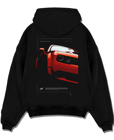 Black pullover hoodie laid flat on a white background, featuring Dodge Challenger srt racing muscle street enthusiast graphic.