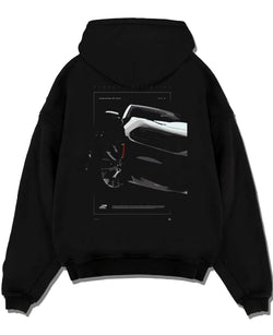 Black pullover hoodie laid flat on a white background, featuring Dodge Charger racing muscle street enthusiast performance graphic.
