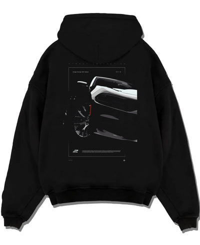 Black pullover hoodie laid flat on a white background, featuring Dodge Charger racing muscle street enthusiast performance graphic.