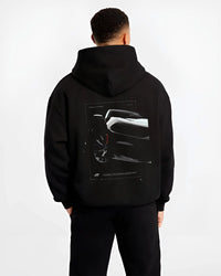 Black hoodie worn by a male model, back view, featuring Dodge Charger racing muscle street enthusiast performance graphic.