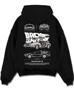 Black pullover hoodie laid flat on a white background, featuring DeLorean DMC-12 street retro racing performance motorsport dmcbtf.
