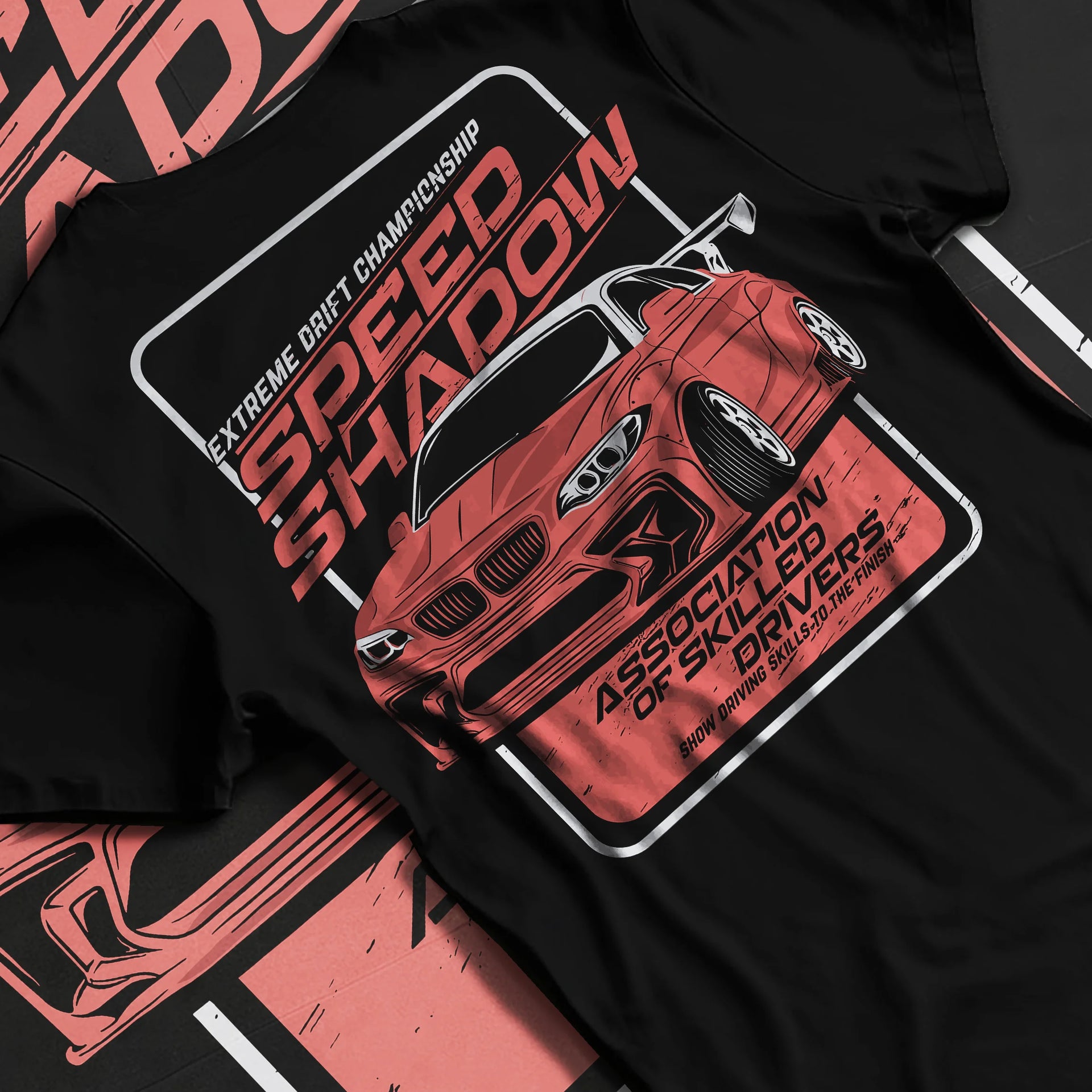 Black T-shirt laid flat with natural fabric folds, featuring rs racing drift motorsport street speed performance automotive graphic.