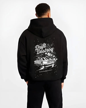 Black hoodie worn by a male model, back view, featuring racing drift street retro performance motorsport automotive graphic.