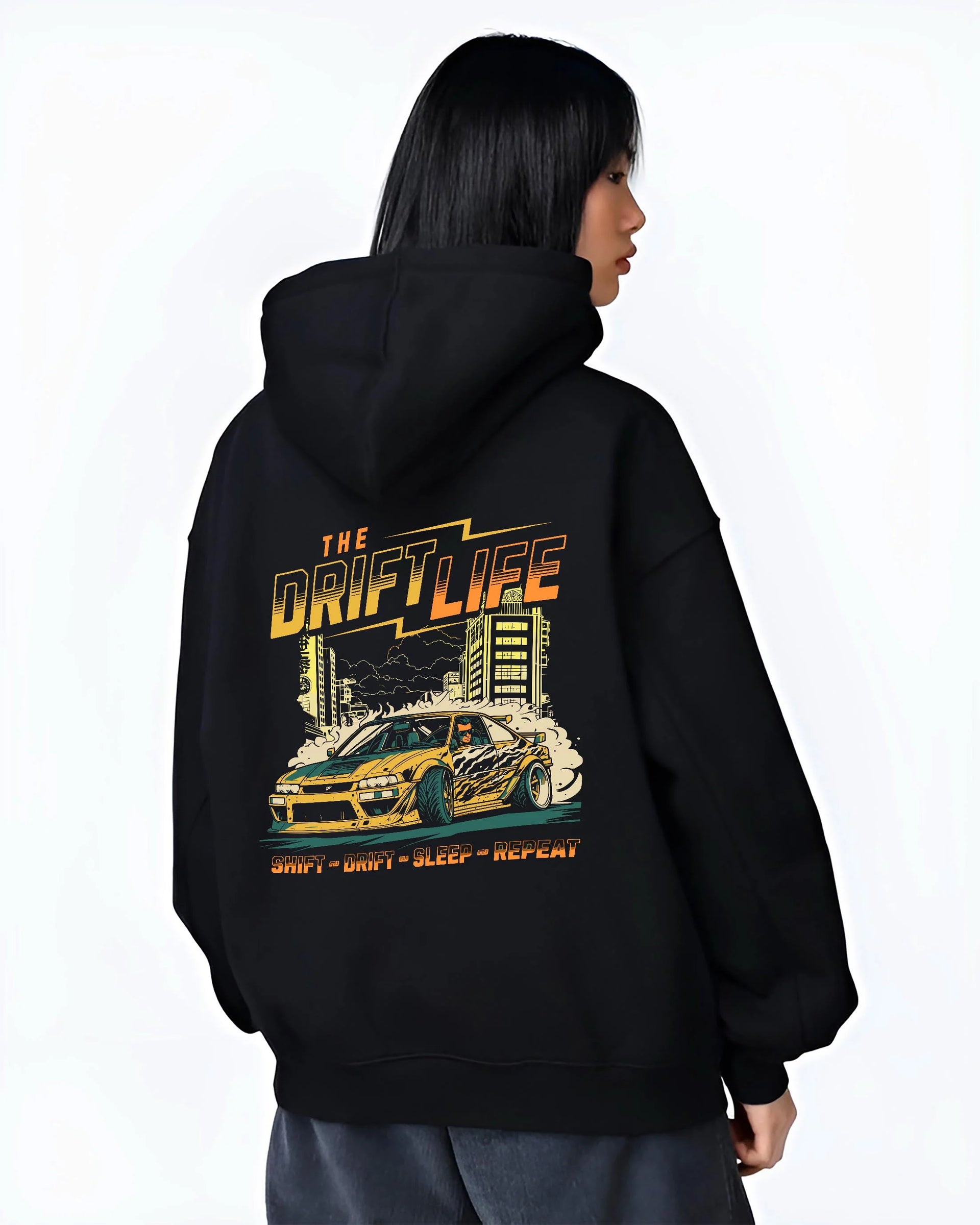 Black hoodie worn by a female model, back view, featuring racing drift jdm street retro vintage performance motorsport graphic.