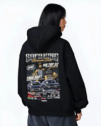 Black hoodie worn by a female model, back view, featuring racing drift jdm tuner street enthusiast show performance graphic.