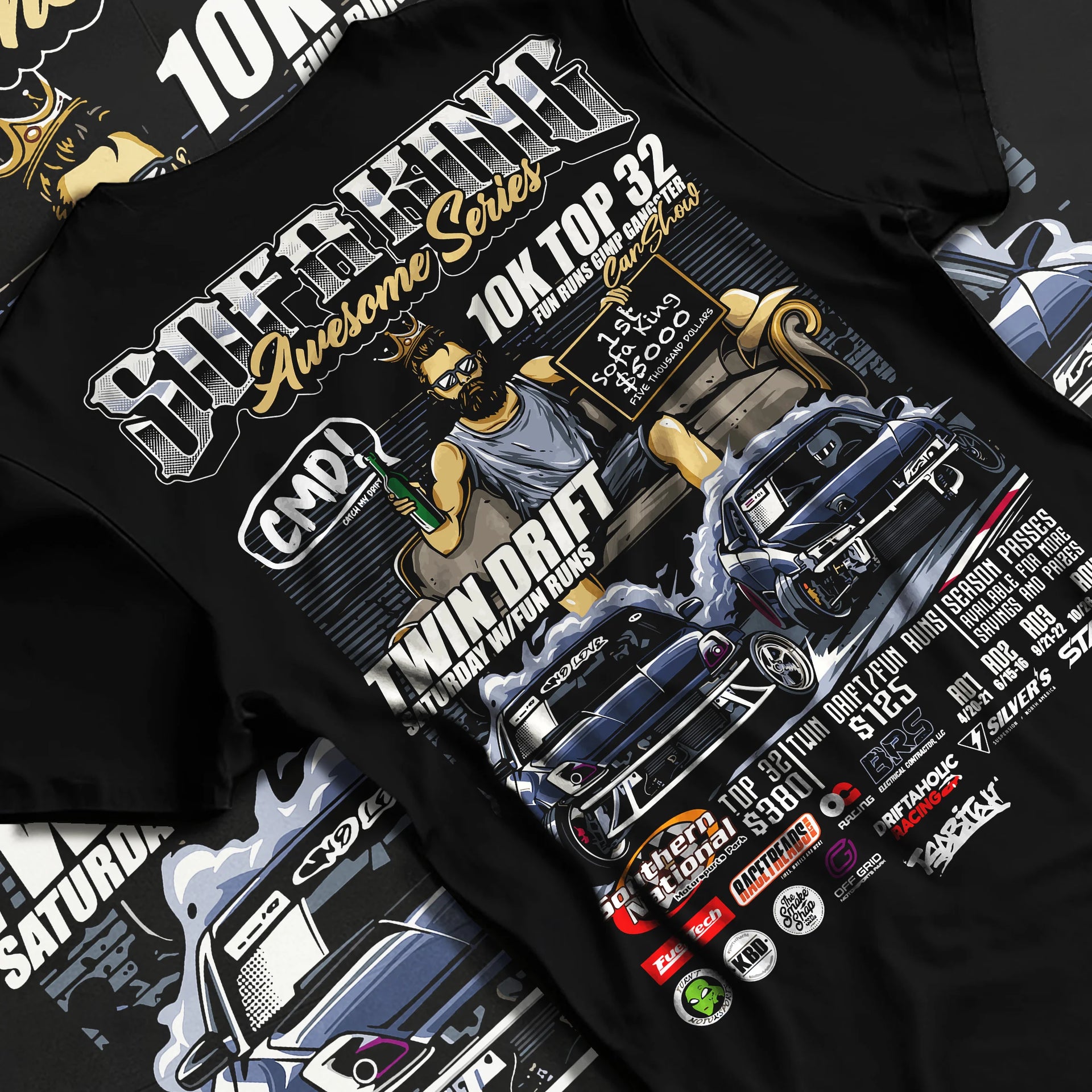 Black T-shirt laid flat with natural fabric folds, featuring racing drift jdm tuner street enthusiast show performance graphic.