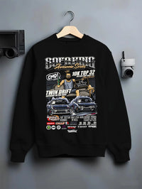 Black crewneck sweatshirt on a hanger against a grey wall, featuring racing drift jdm tuner street enthusiast show graphic.