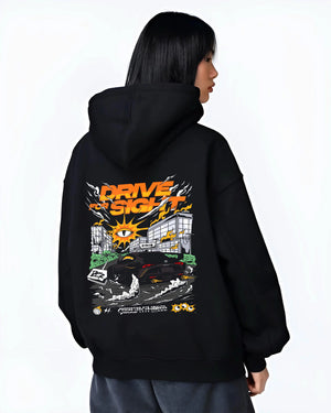 Black hoodie worn by a female model, back view, featuring racing drift street performance motorsport automotive enthusiast graphic.
