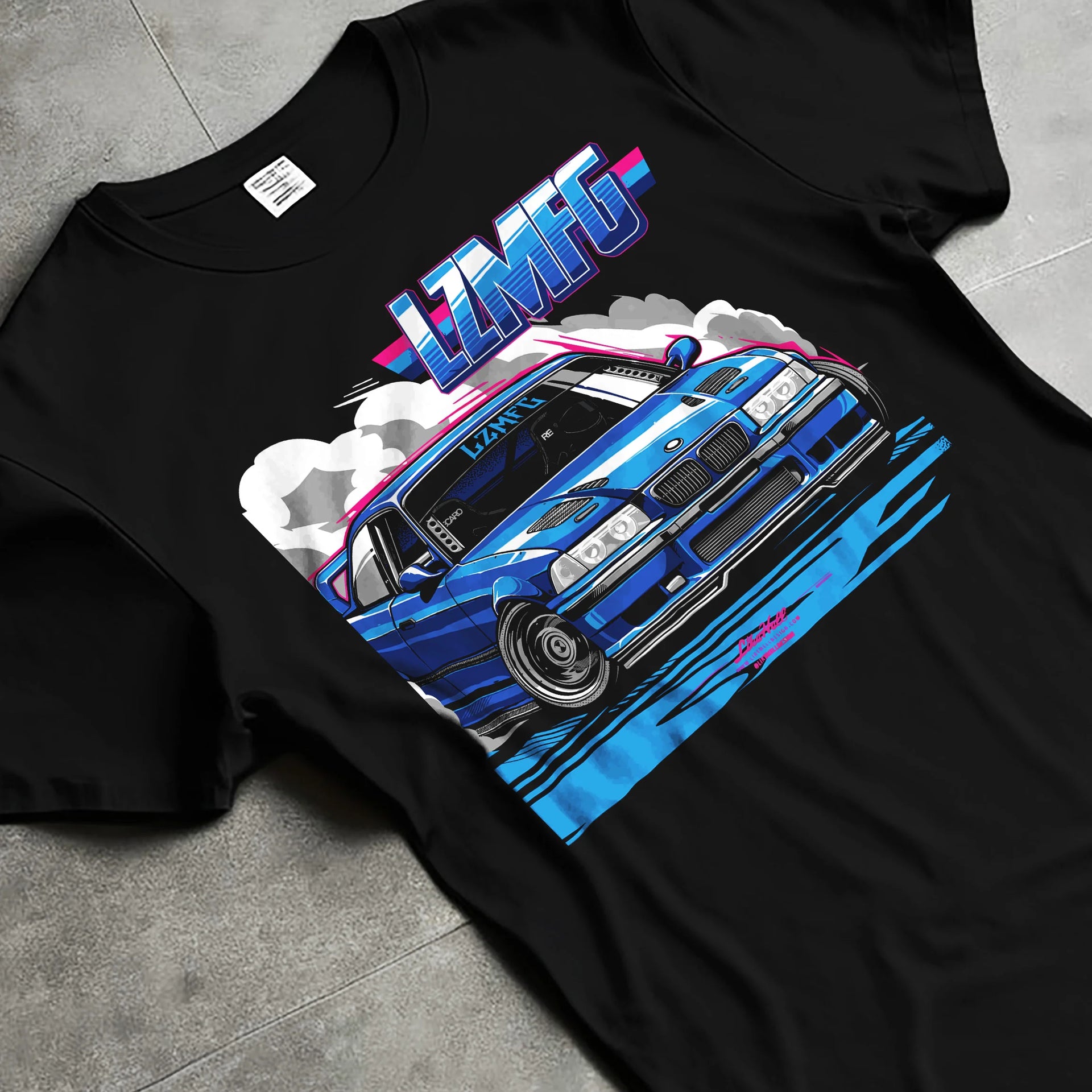 Black T-shirt laid flat with natural fabric folds, featuring BMW rs turbo racing drift motorsport euro german street retro e12cls.