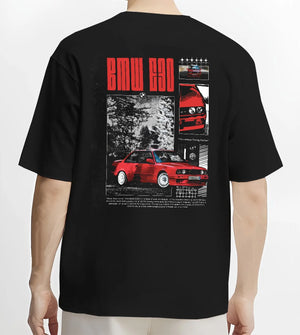 Black T-shirt worn by a male model, back view, featuring BMW rs turbo racing drift motorsport euro german street retro graphic.