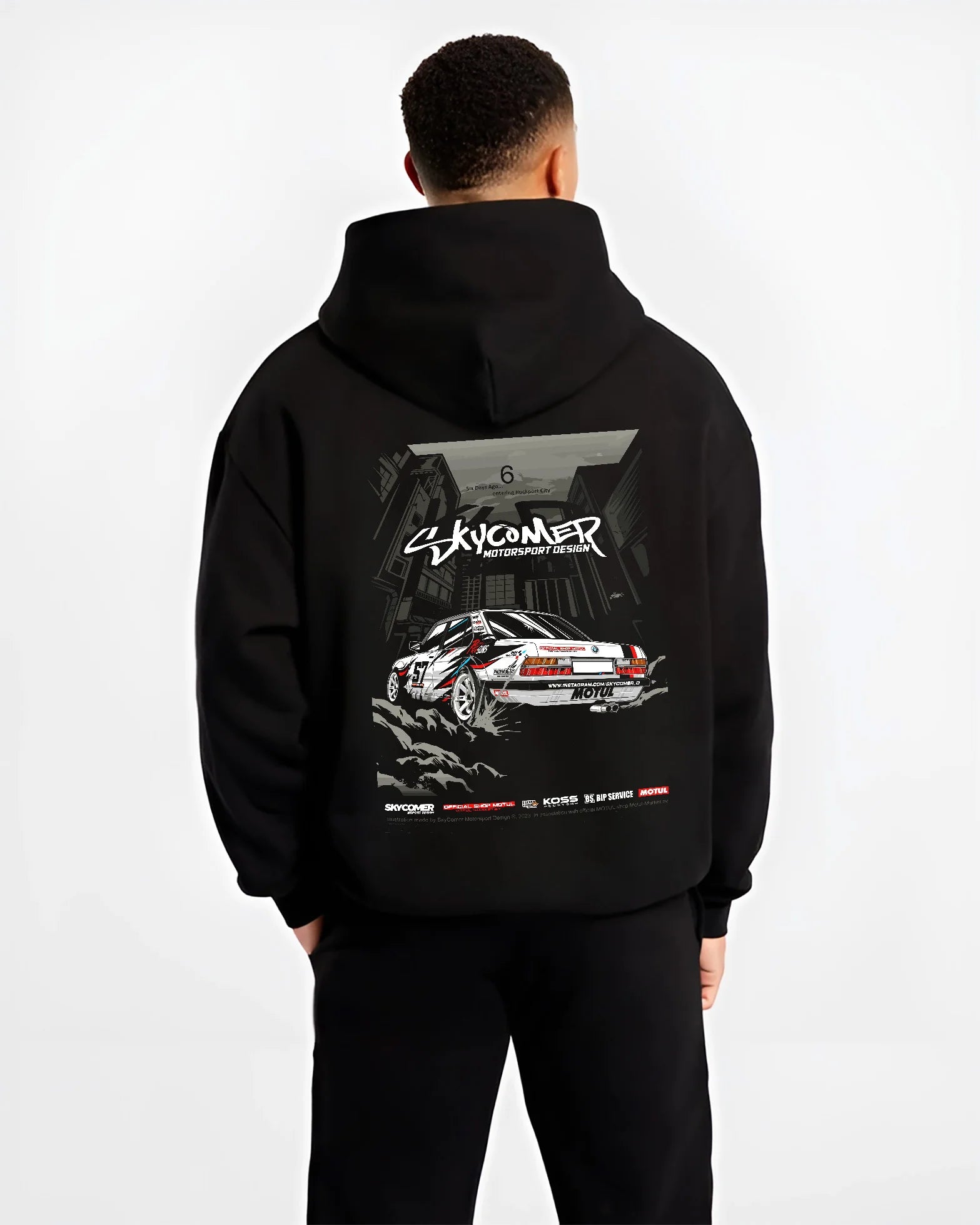Black hoodie worn by a male model, back view, featuring BMW rs turbo racing drift motorsport euro german street retro e28s5r.