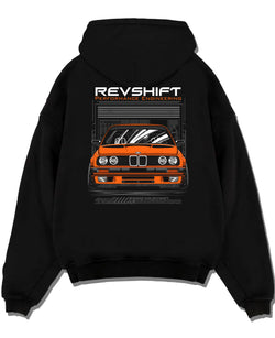 Black pullover hoodie laid flat on a white background, featuring BMW E30 rs motorsport street vintage classic racing graphic.