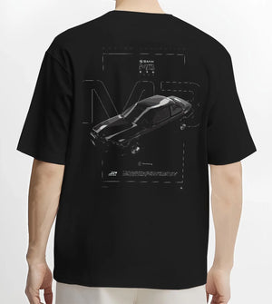 Black T-shirt worn by a male model, back view, featuring BMW rs turbo racing drift motorsport german street retro classic graphic.