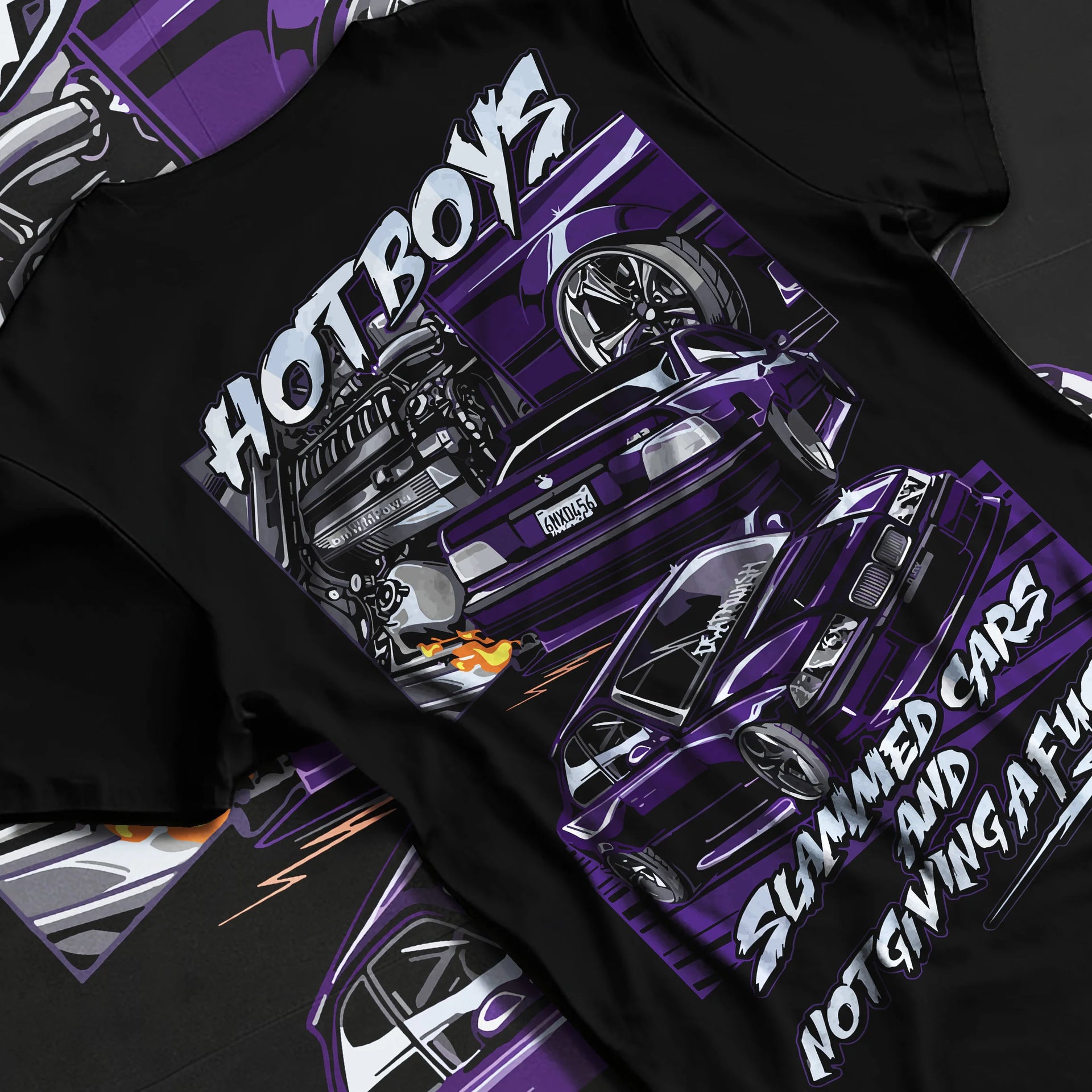 Black T-shirt laid flat with natural fabric folds, featuring BMW M3 rs turbo racing drift motorsport euro german street graphic.