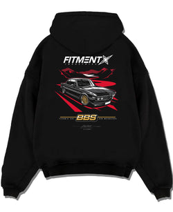 Black pullover hoodie laid flat on a white background, featuring BMW rs turbo ls racing motorsport euro street retro graphic.