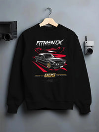 Black crewneck sweatshirt on a hanger against a grey wall, featuring BMW rs turbo ls racing motorsport euro street retro graphic.