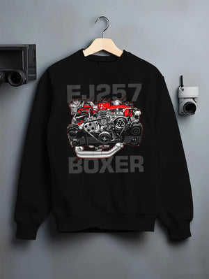 Black crewneck sweatshirt on a hanger against a grey wall, featuring Subaru turbo turbocharged racing rally jdm japanese graphic.