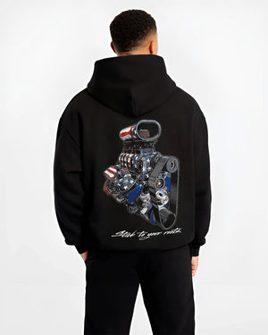 Black hoodie worn by a male model, back view, featuring v8 american muscle retro classic enthusiast racing street graphic.