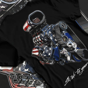 Black T-shirt laid flat with natural fabric folds, featuring v8 american muscle retro classic enthusiast racing street graphic.