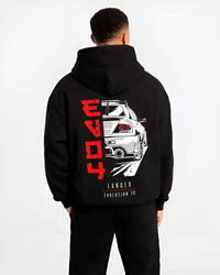 Black hoodie worn by a male model, back view, featuring Mitsubishi EVO turbo racing drift track jdm street enthusiast graphic.