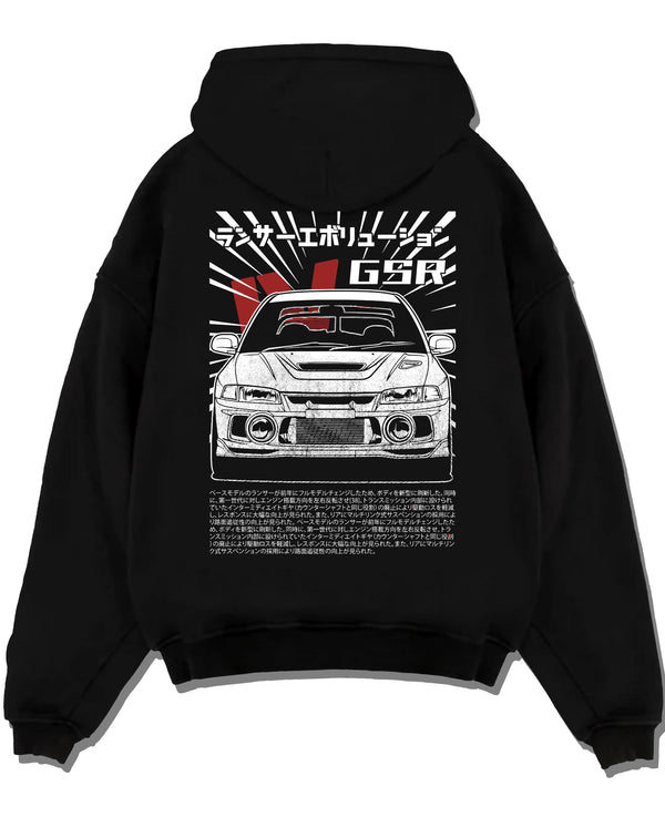 Black pullover hoodie laid flat on a white background, featuring Mitsubishi EVO lancer turbo racing drift jdm japanese graphic.
