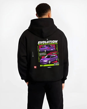 Black hoodie worn by a male model, back view, featuring Mitsubishi Lancer Evo VII evo lancer turbo racing jdm street graphic.