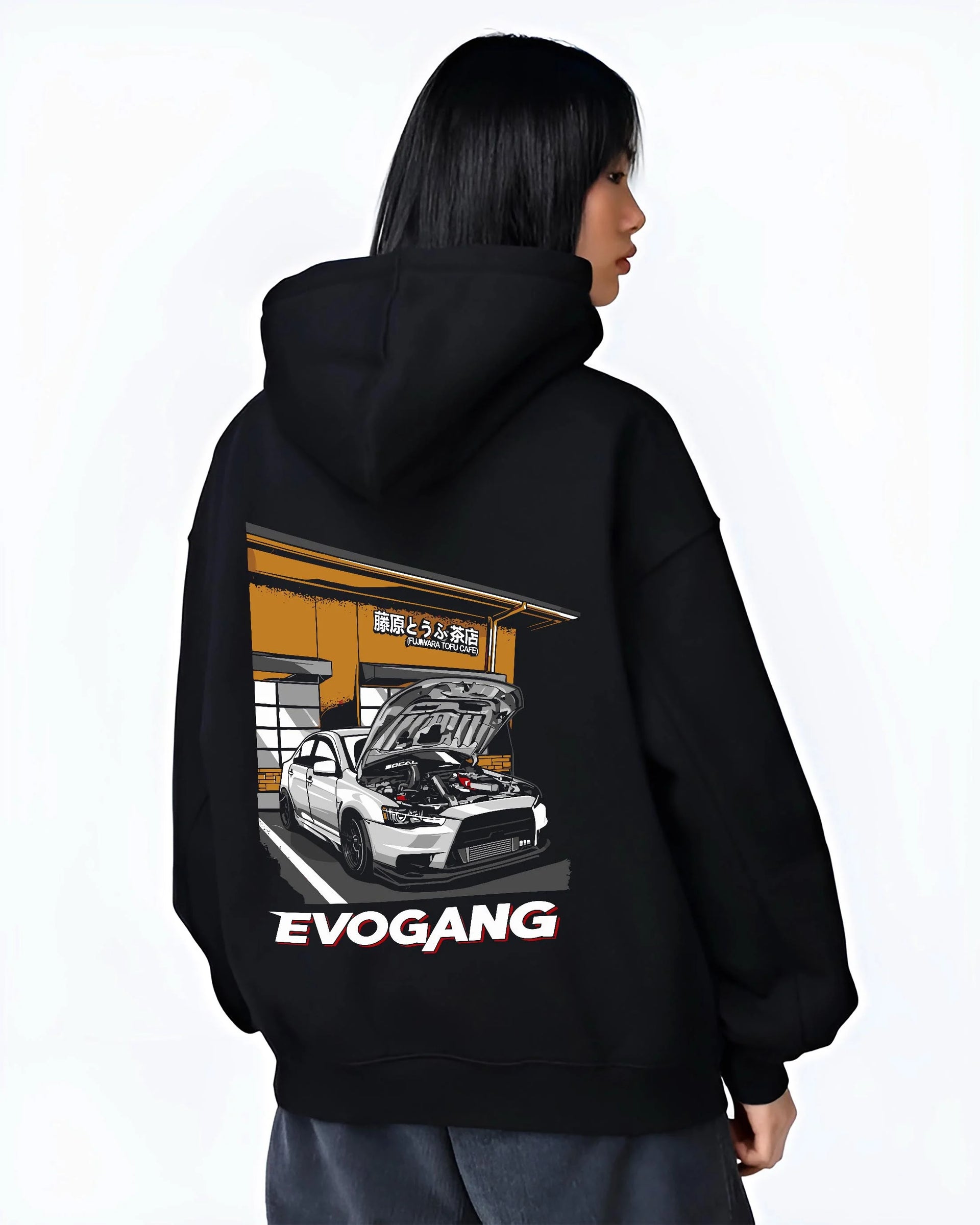 Black hoodie worn by a female model, back view, featuring Mitsubishi EVO rs racing jdm tuner street performance graphic.