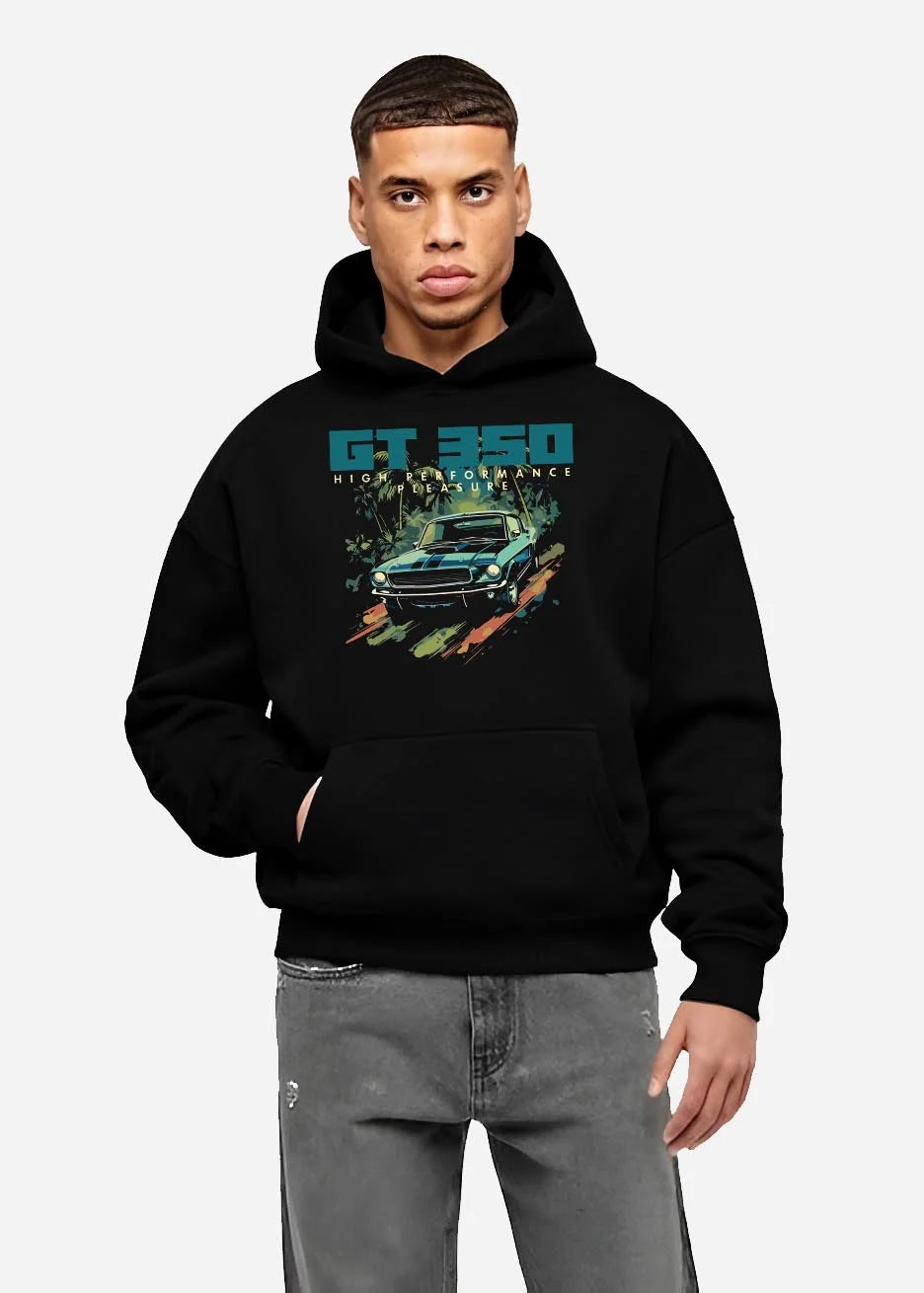 Black hoodie worn by a male model, front view, featuring Ford Mustang street retro classic enthusiast racing performance graphic.