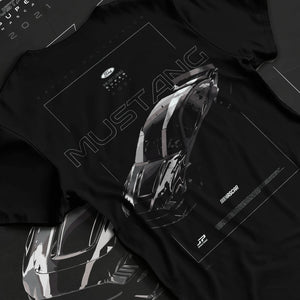 Black T-shirt laid flat with natural fabric folds, featuring Ford Mustang rs muscle street classic racing performance graphic.