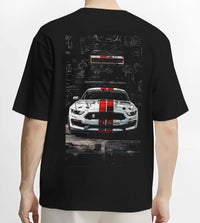 Black T-shirt worn by a male model, back view, featuring Ford Mustang rs racing muscle street retro show graphic.