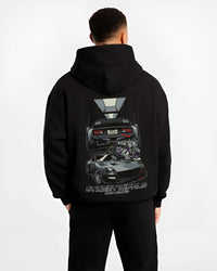 Black hoodie worn by a male model, back view, featuring Ford MUSTANG rs racing muscle retro classic street graphic.