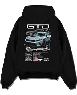 Black pullover hoodie laid flat on a white background, featuring MUSTANG supercharged v8 racing american muscle street graphic.