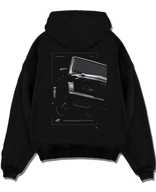 Black pullover hoodie laid flat on a white background, featuring Mercedes-Benz AMG rs racing street performance motorsport graphic.