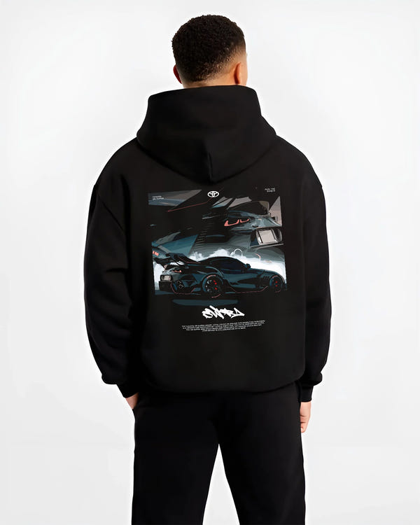 Black hoodie worn by a male model, back view, featuring Toyota Supra turbo turbocharged racing drift jdm japanese tuner graphic.