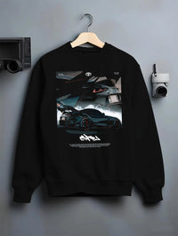 Black crewneck sweatshirt on a hanger against a grey wall, featuring Toyota Supra turbo turbocharged racing drift jdm graphic.