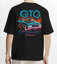 Black T-shirt worn by a male model, back view, featuring Pontiac GTO muscle street retro vintage classic enthusiast graphic.